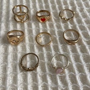 Set of 8 gold rings